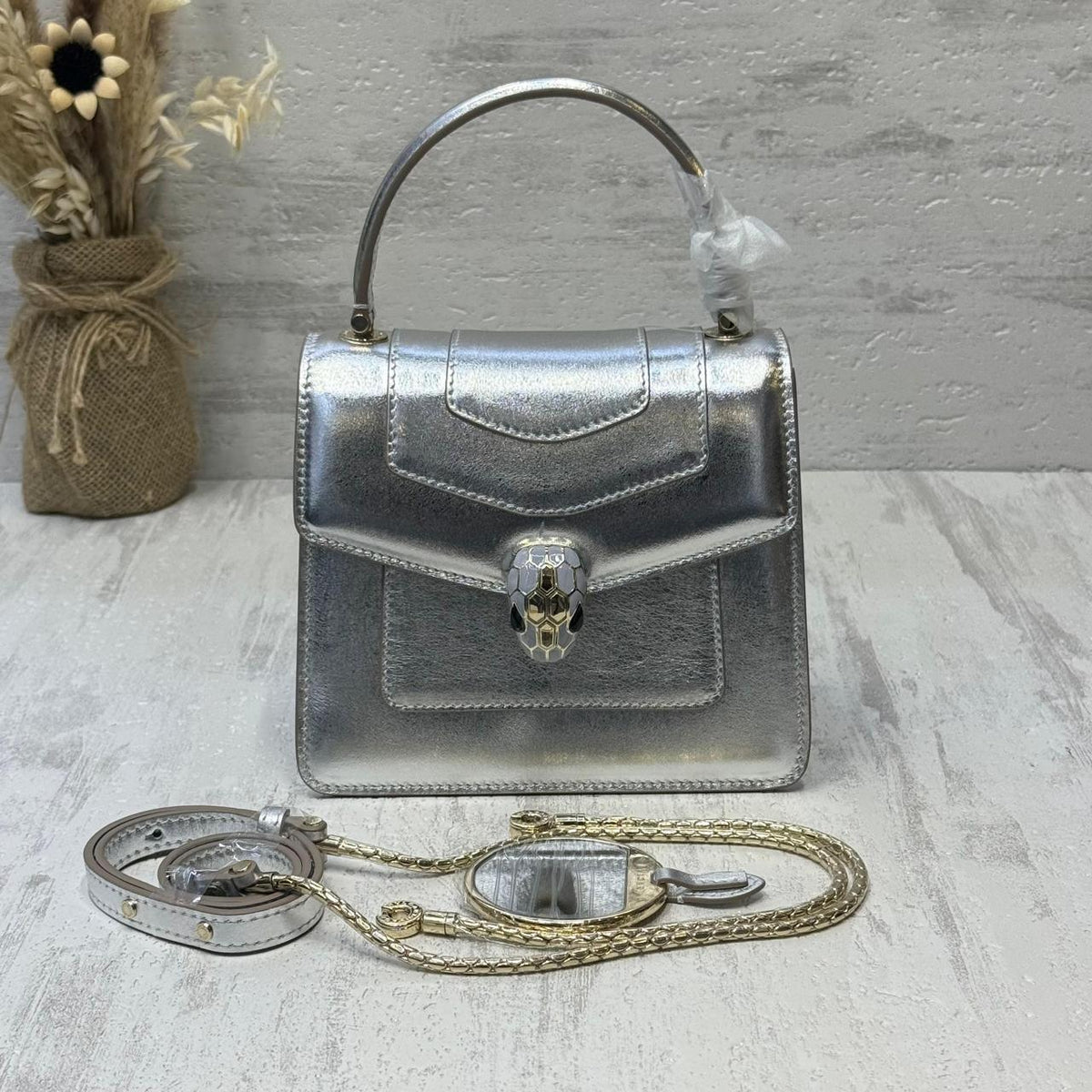 Ladies B*LG*RI bags.