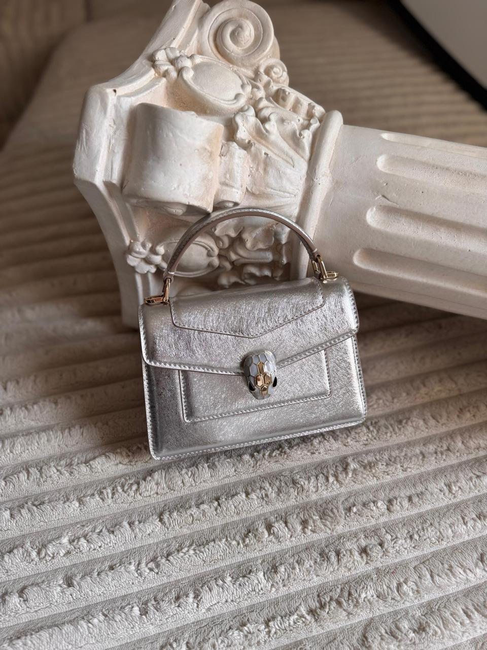 Ladies B*LG*RI bags.