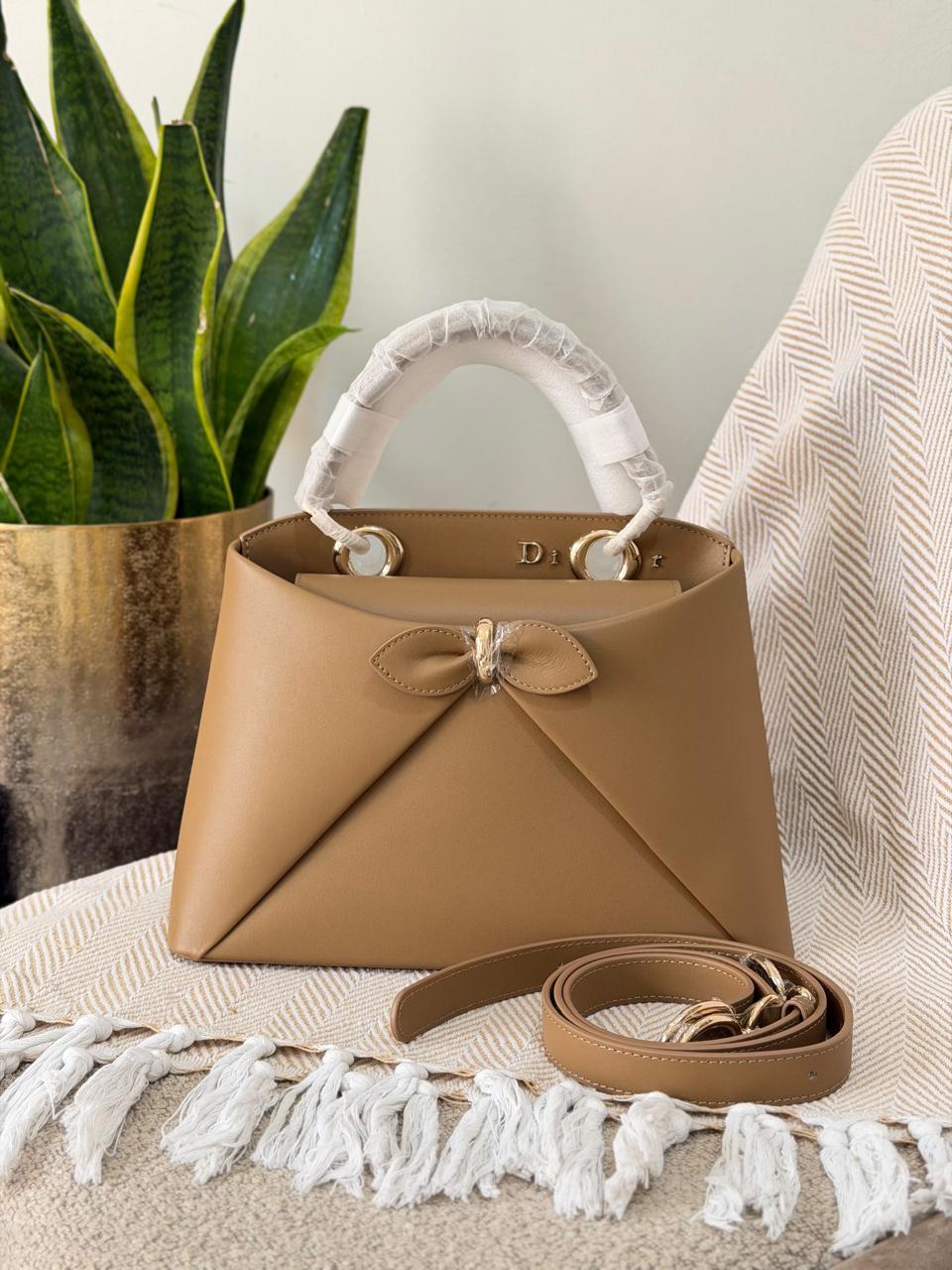 Ladies DI*R bags.