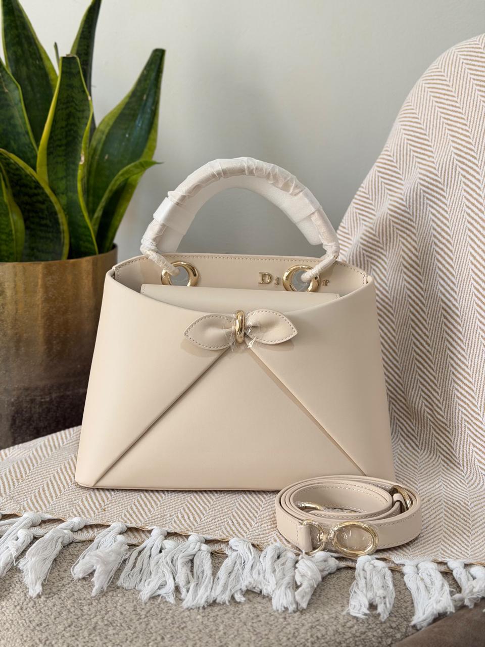 Ladies DI*R bags.