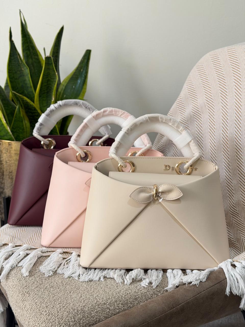 Ladies DI*R bags.