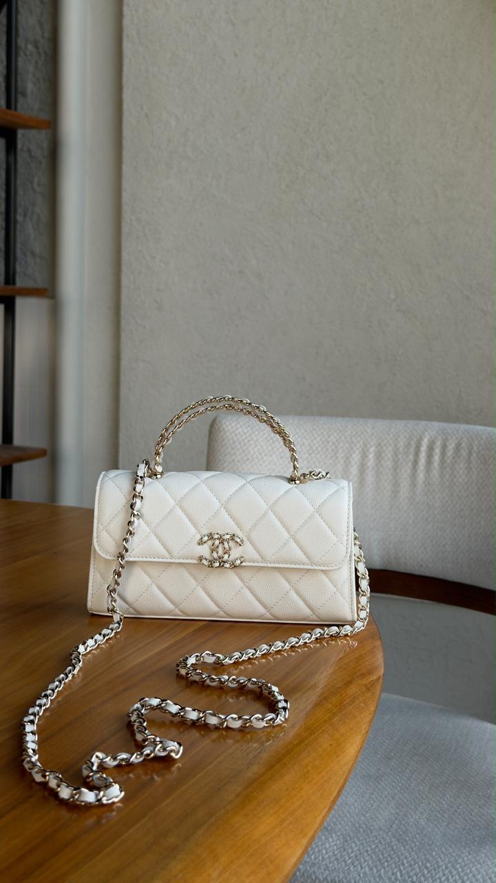 Ladies CH**NEL bags.