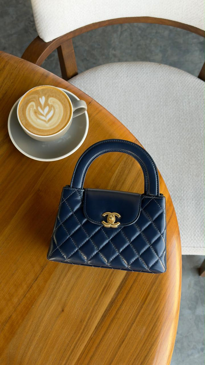 Ladies CH**NEL bags.