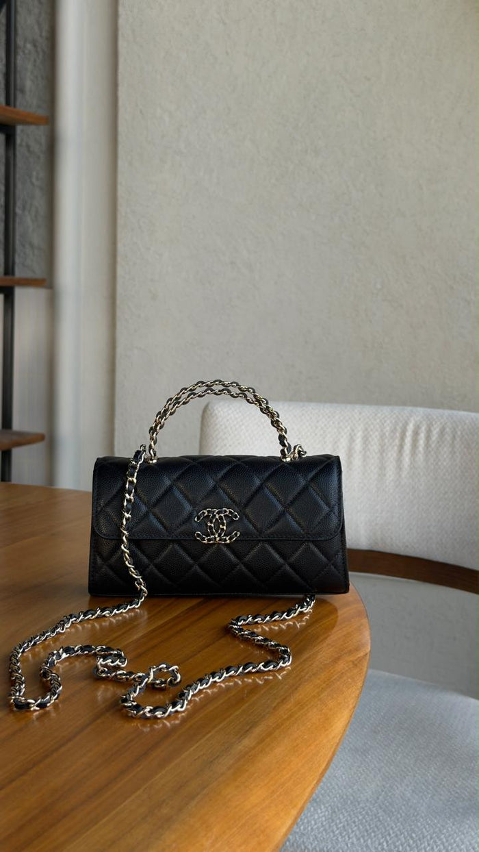 Ladies CH**NEL bags.