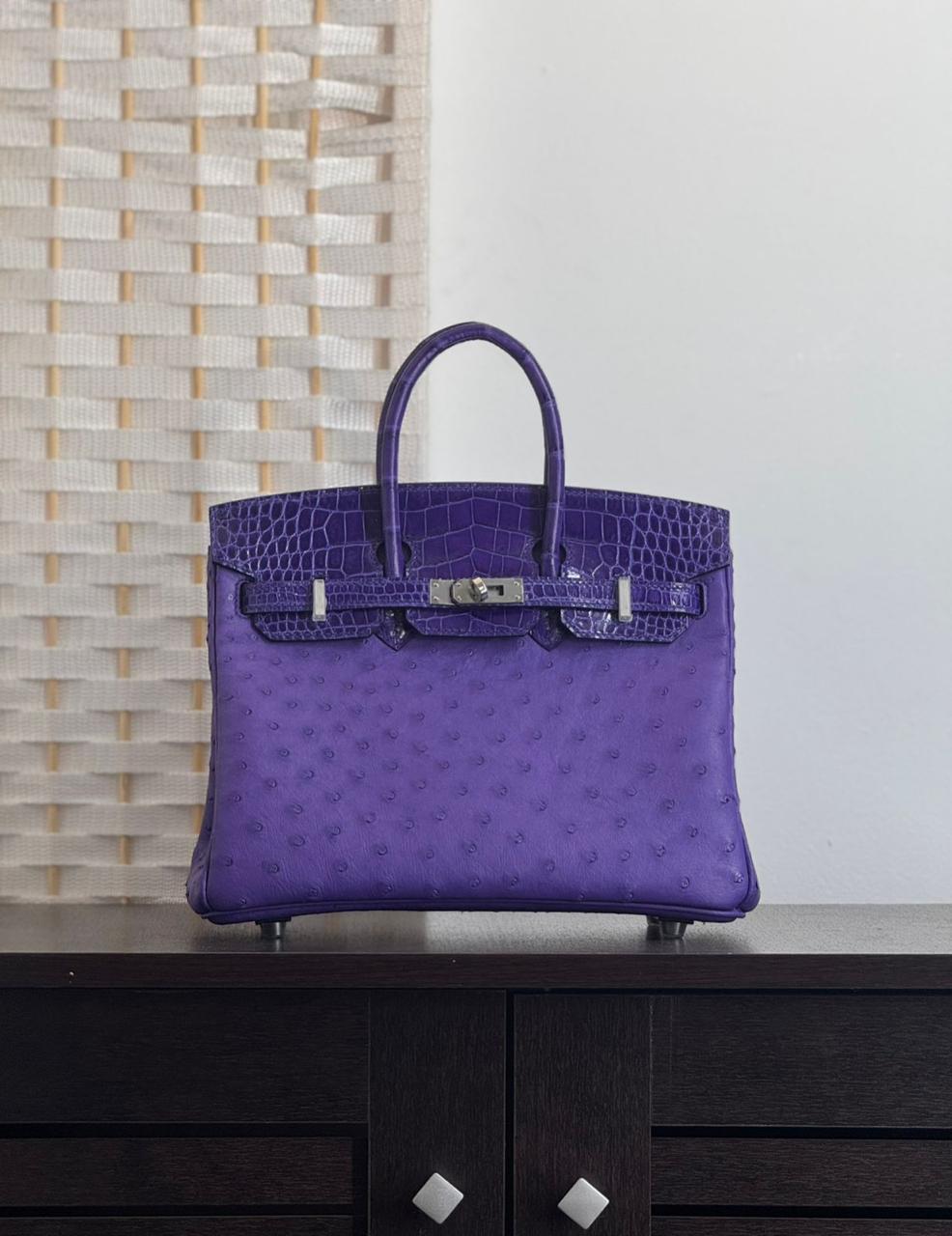 Herm**s ostrich bag.