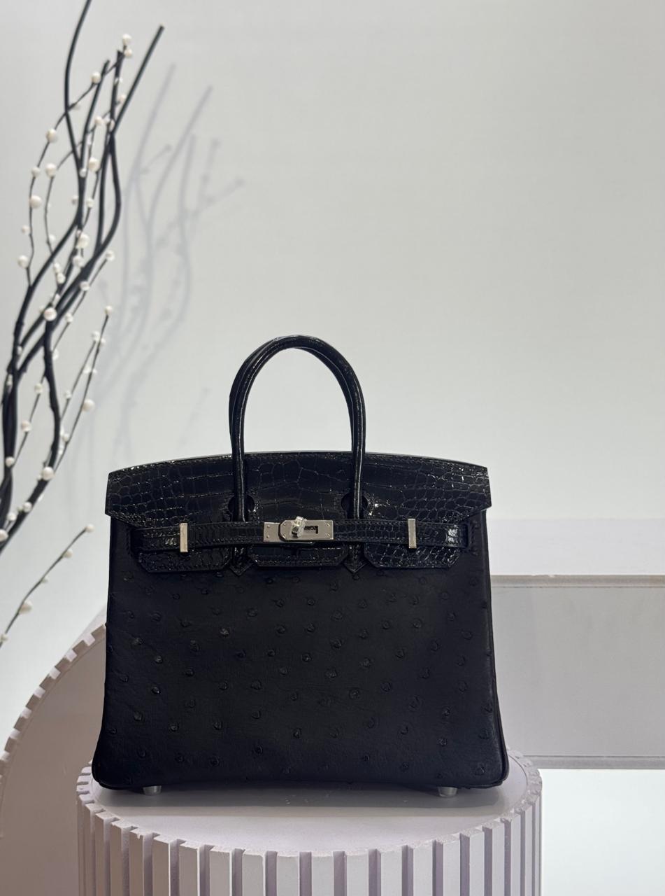 Herm**s ostrich bag.