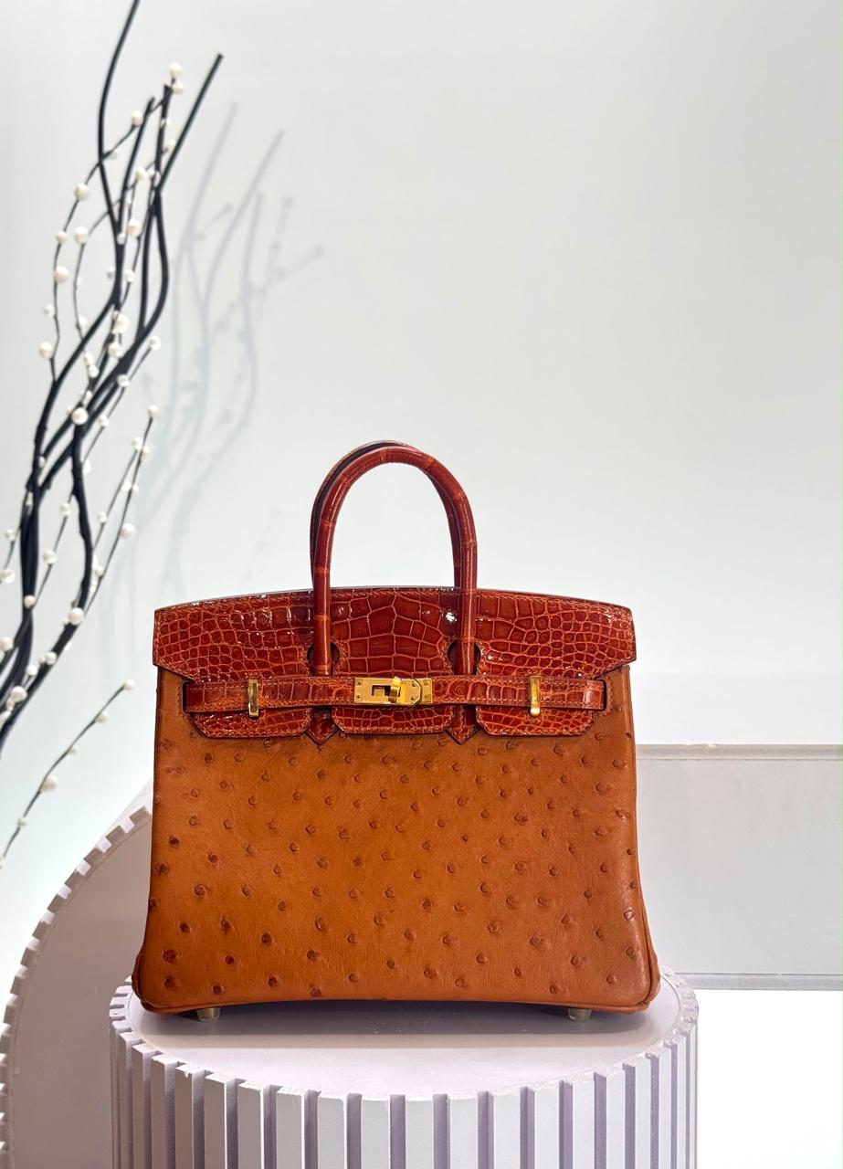 Herm**s ostrich bag.