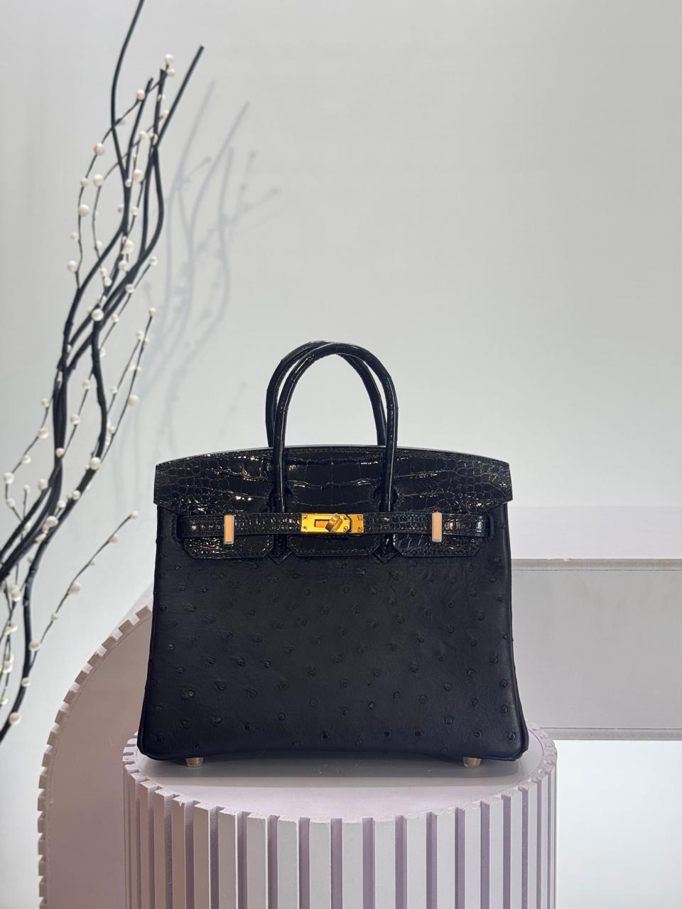 Herm**s ostrich bag.