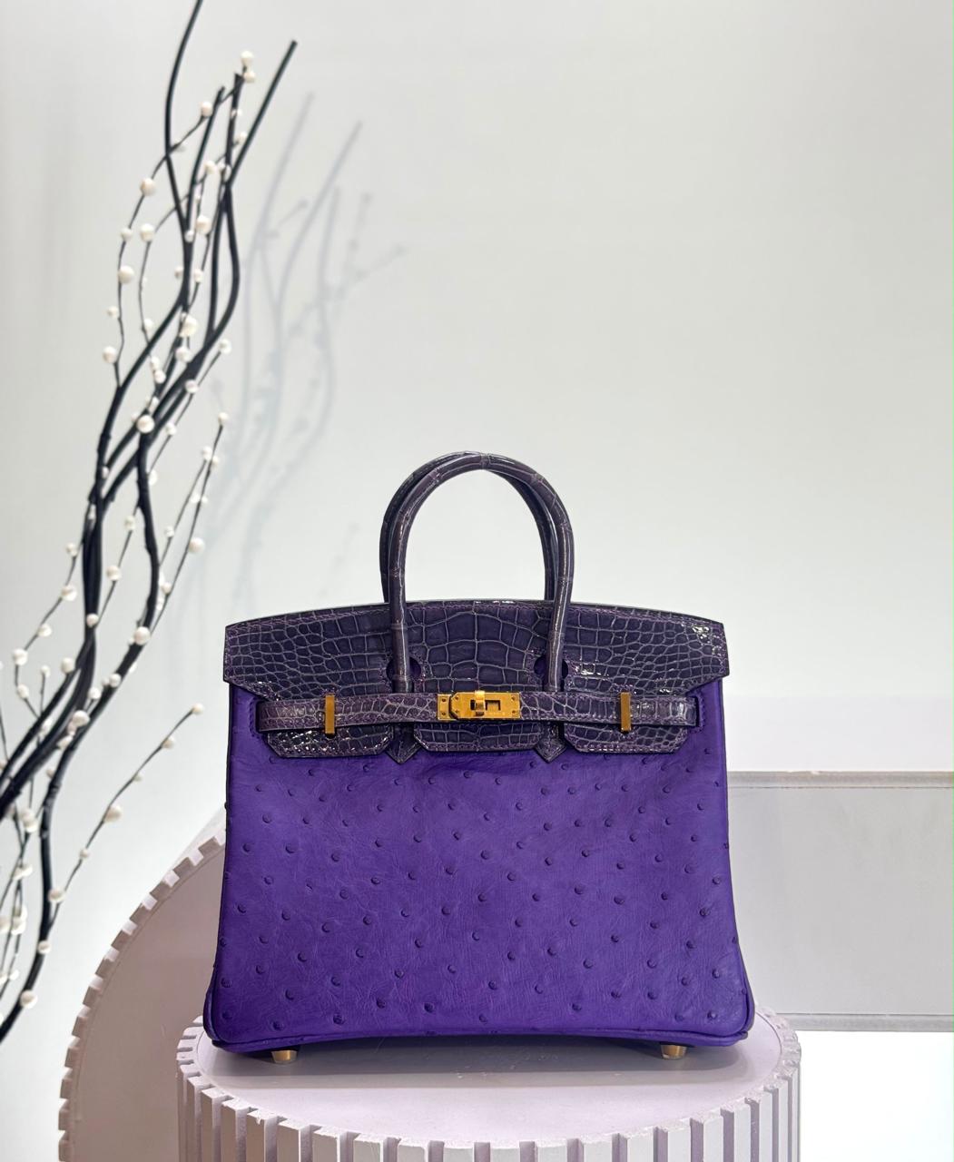 Herm**s ostrich bag.
