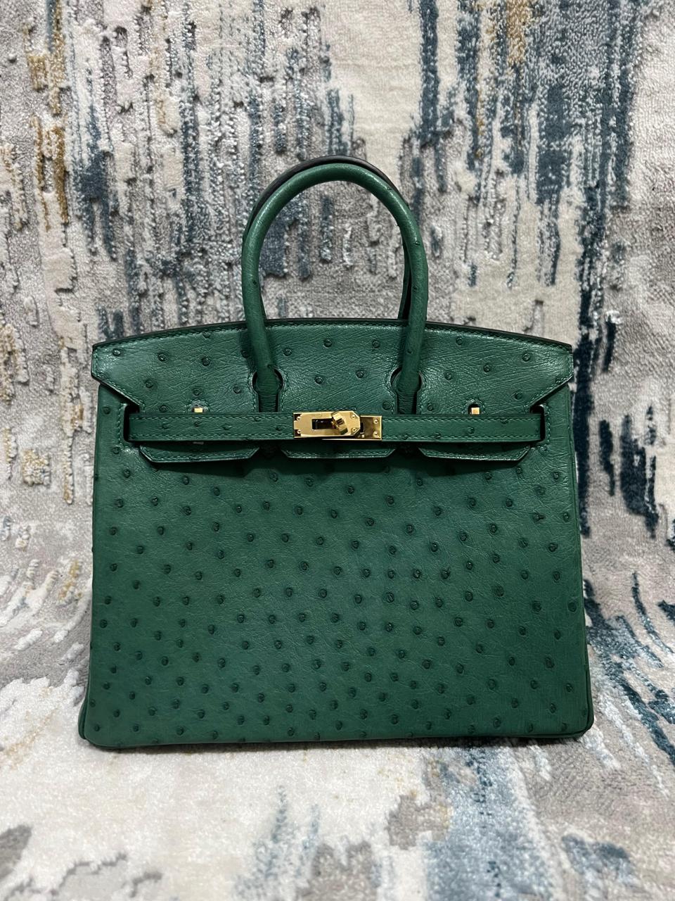Herm**s ostrich bag.