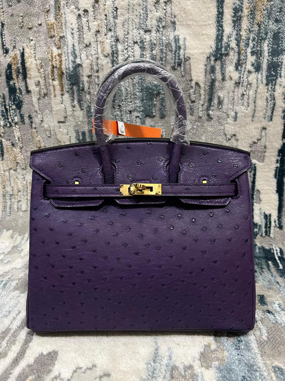 Herm**s ostrich bag.