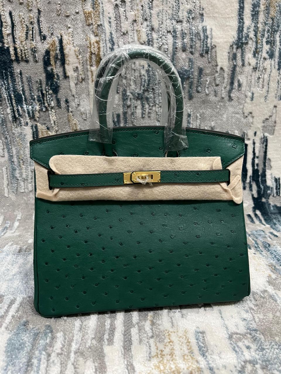 Herm**s ostrich bag.