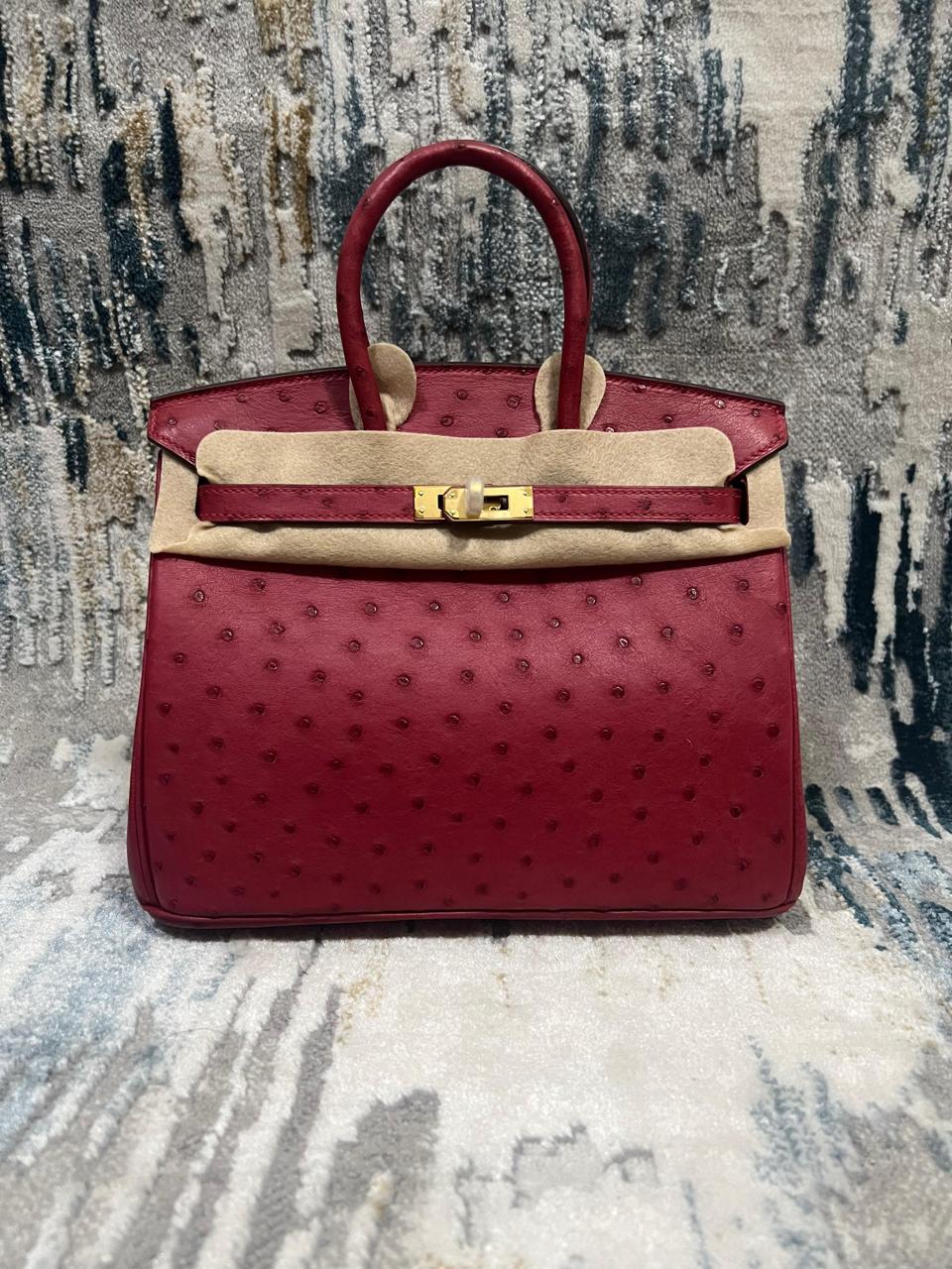 Herm**s ostrich bag.