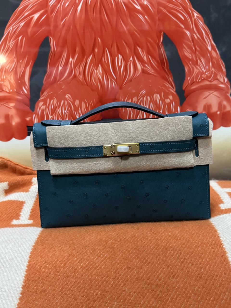 Herm**s ostrich bag.