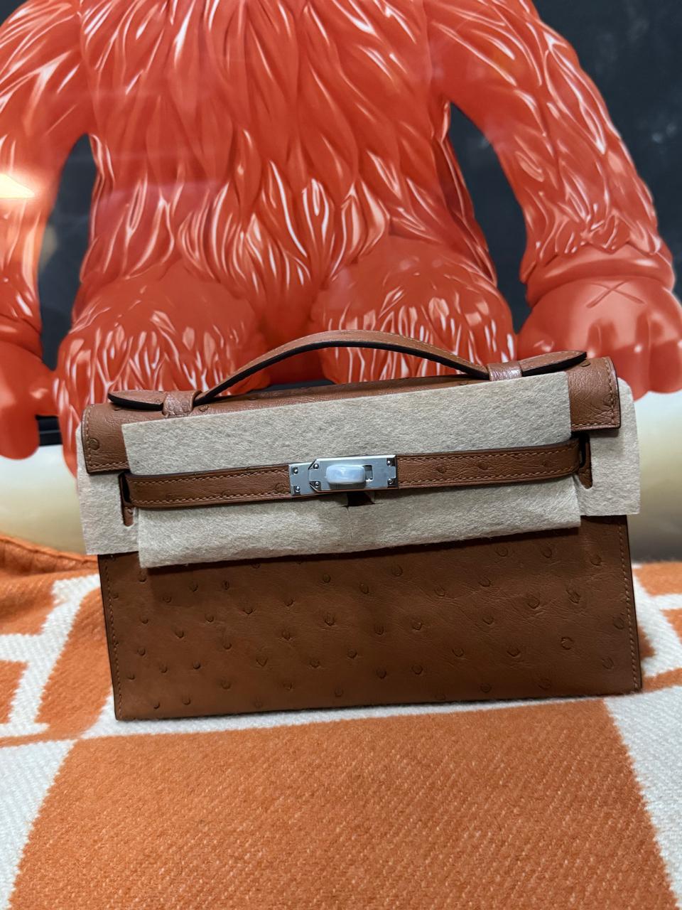 Herm**s ostrich bag.