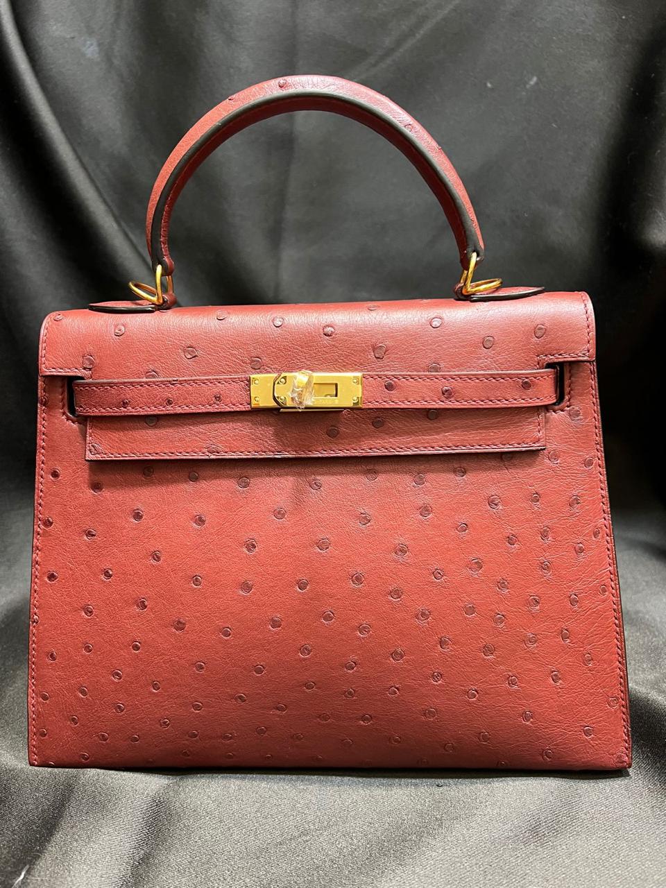 Herm**s ostrich bag.