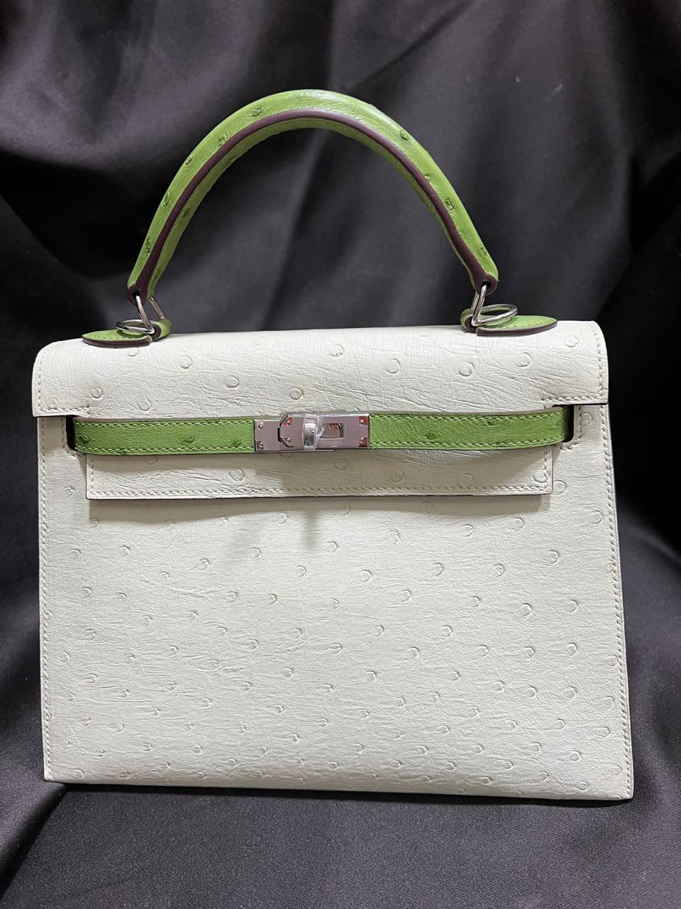 Herm**s ostrich bag.