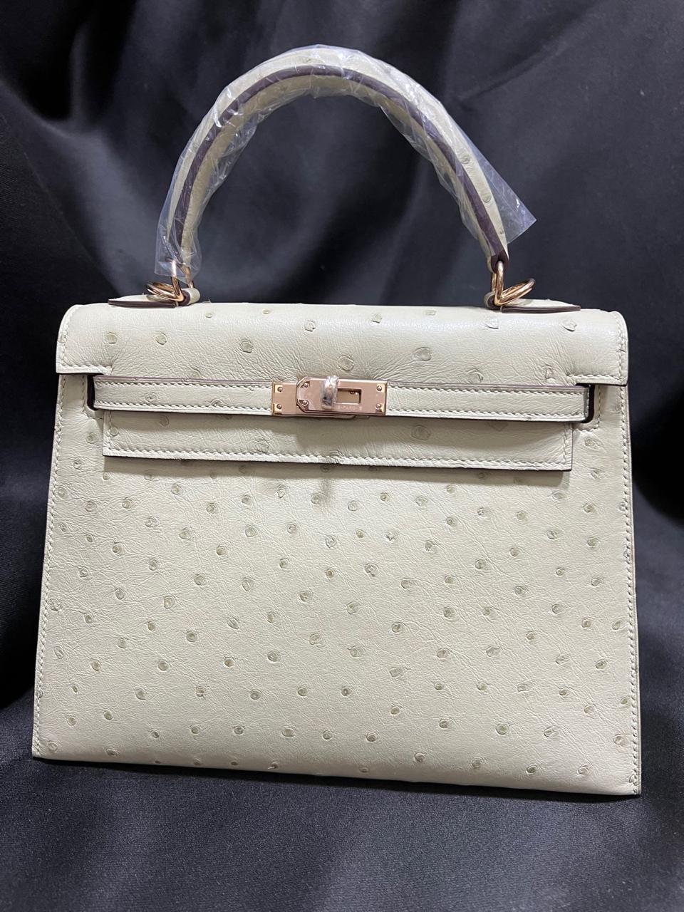 Herm**s ostrich bag.