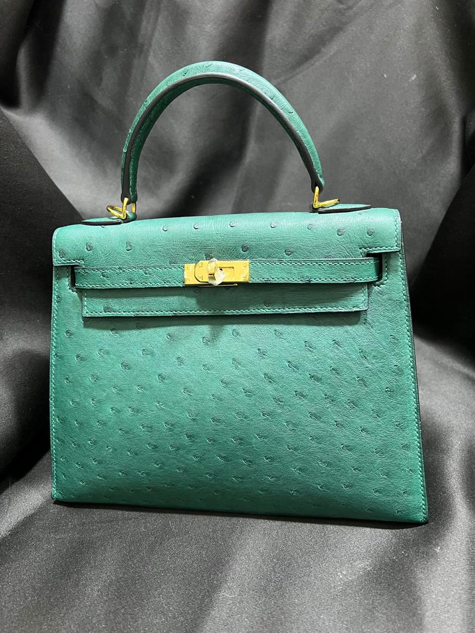 Herm**s ostrich bag.