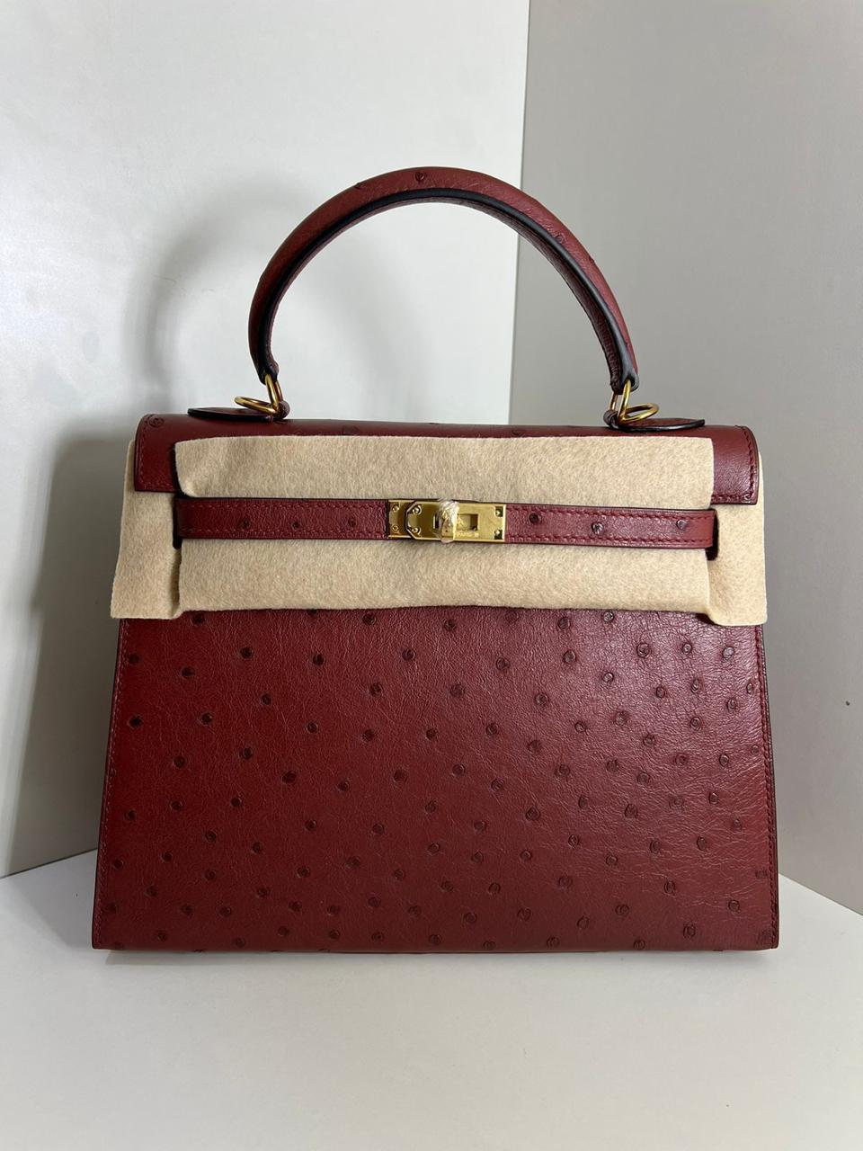 Herm**s ostrich bag.