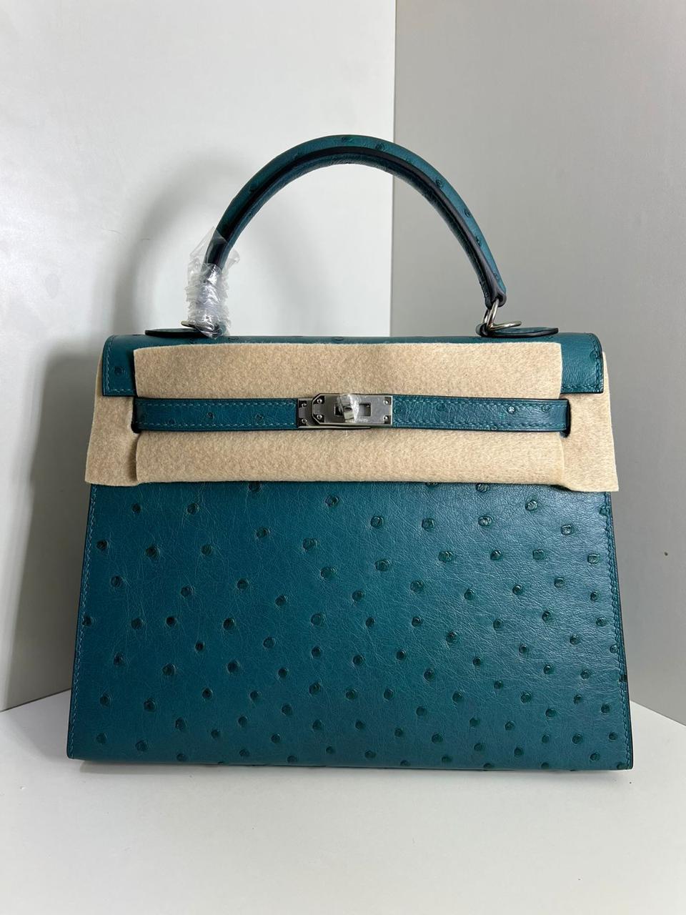 Herm**s ostrich bag.