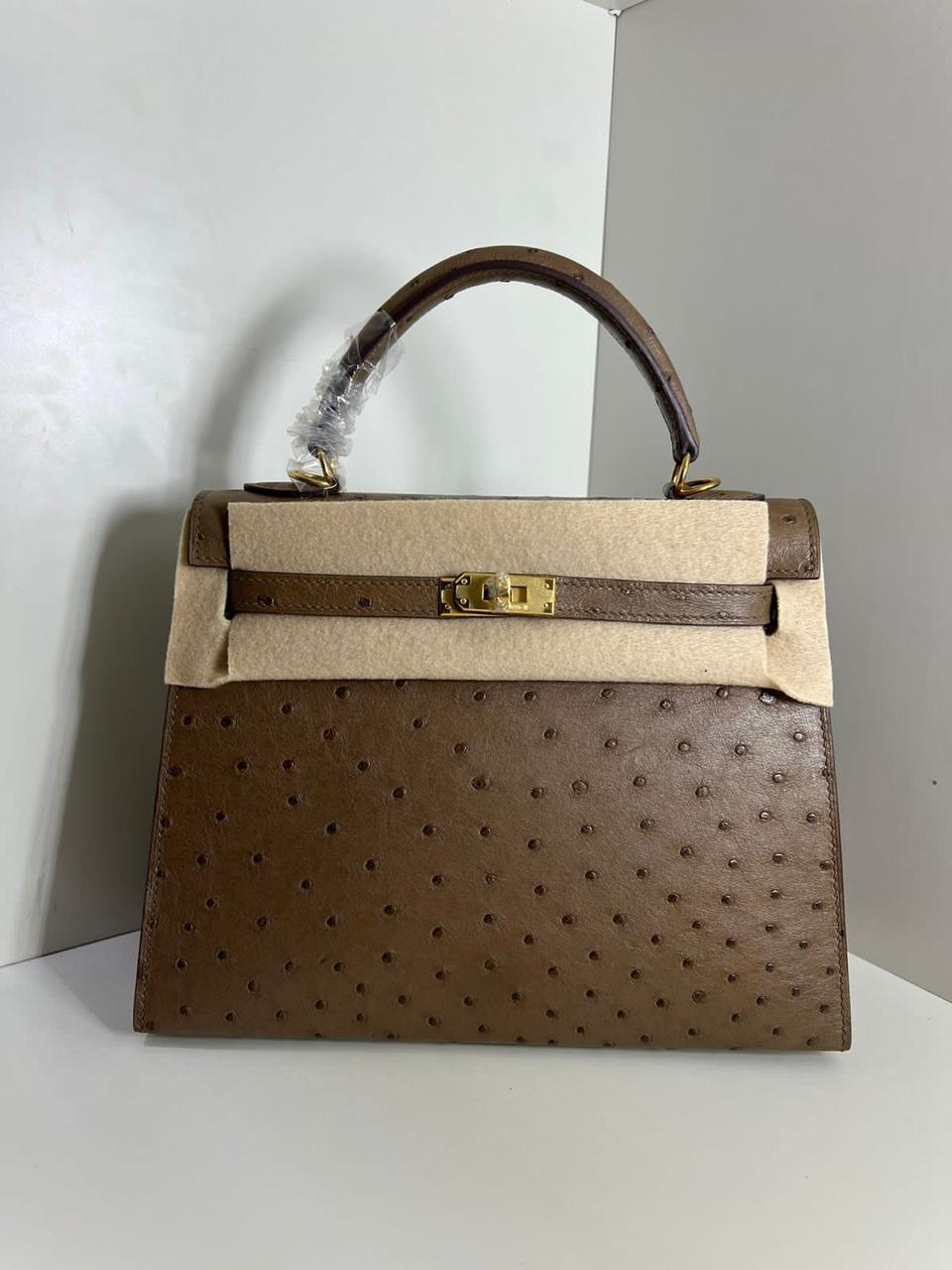 Herm**s ostrich bag.