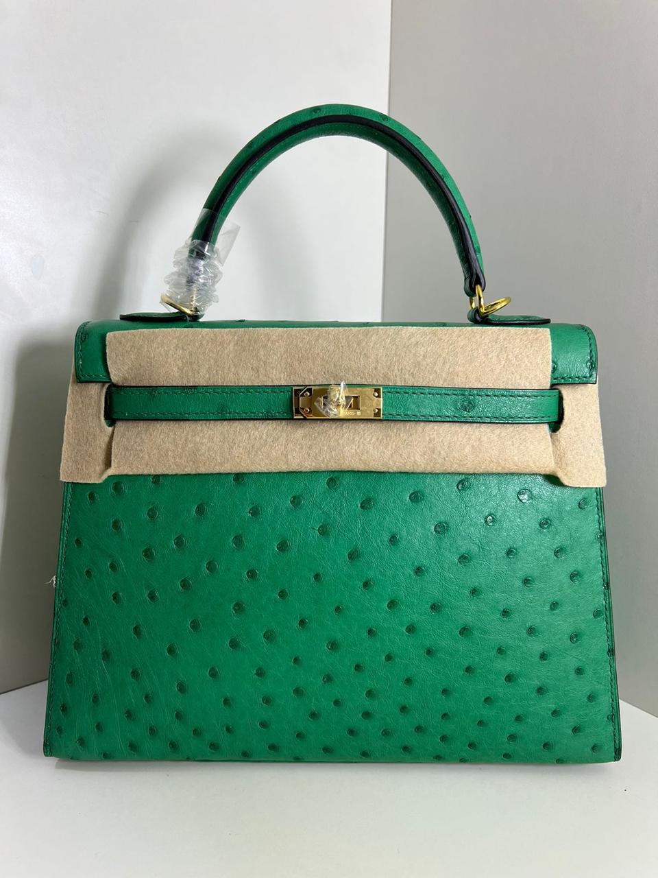 Herm**s ostrich bag.