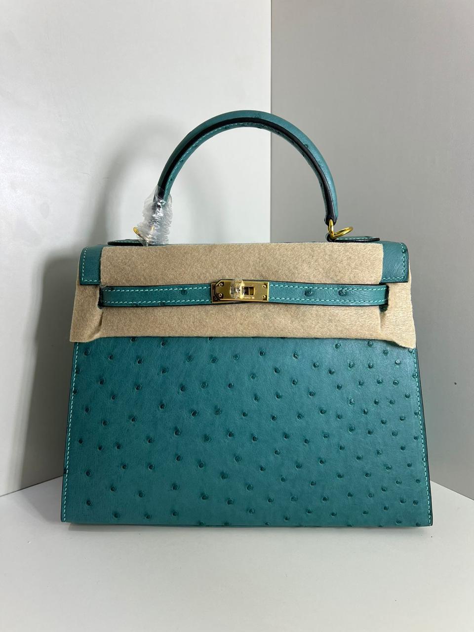 Herm**s ostrich bag.