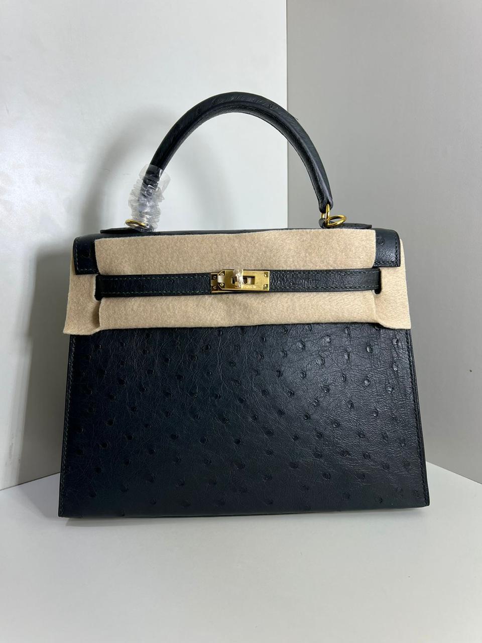 Herm**s ostrich bag.