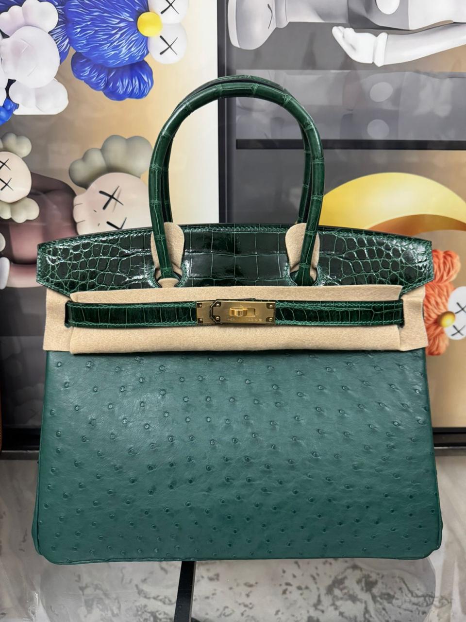 Herm**s ostrich bag.