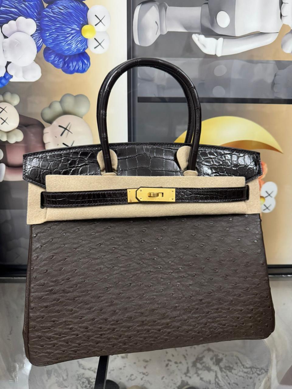 Herm**s ostrich bag.
