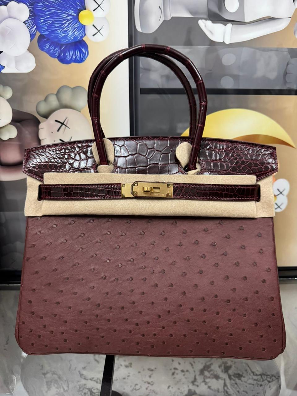 Herm**s ostrich bag.