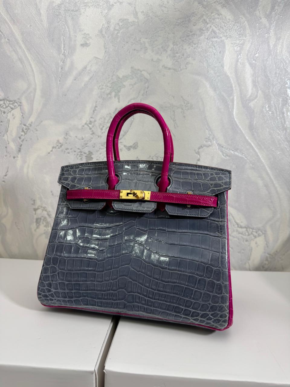 Herm**s crocodile bags.