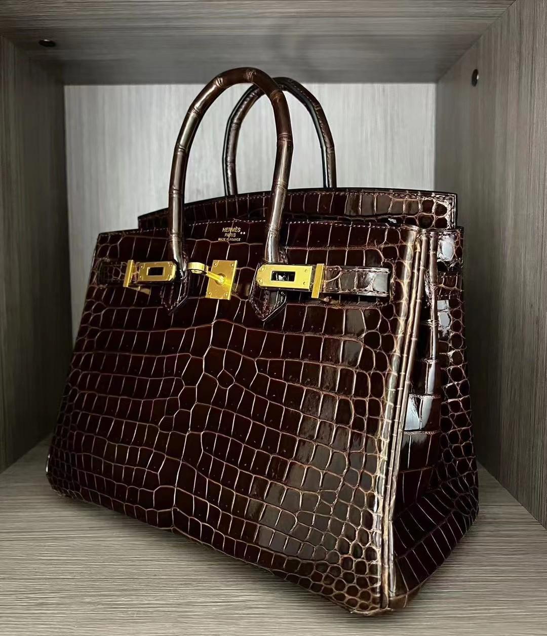 Herm**s crocodile bags.