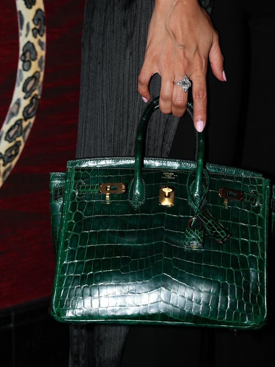 Herm**s crocodile bags.
