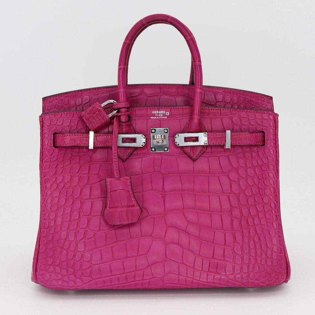 Herm**s crocodile bags.
