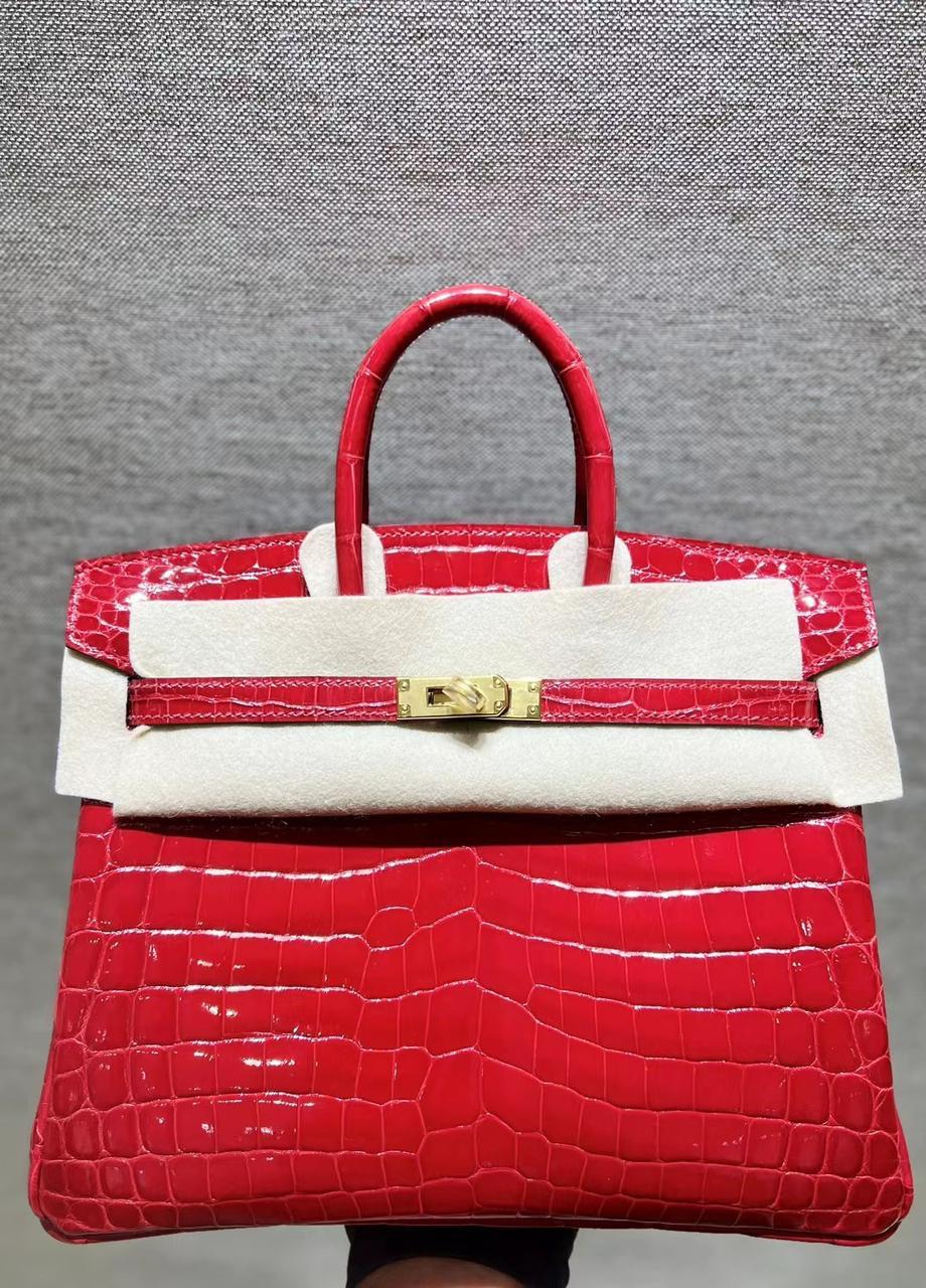 Herm**s crocodile bags.
