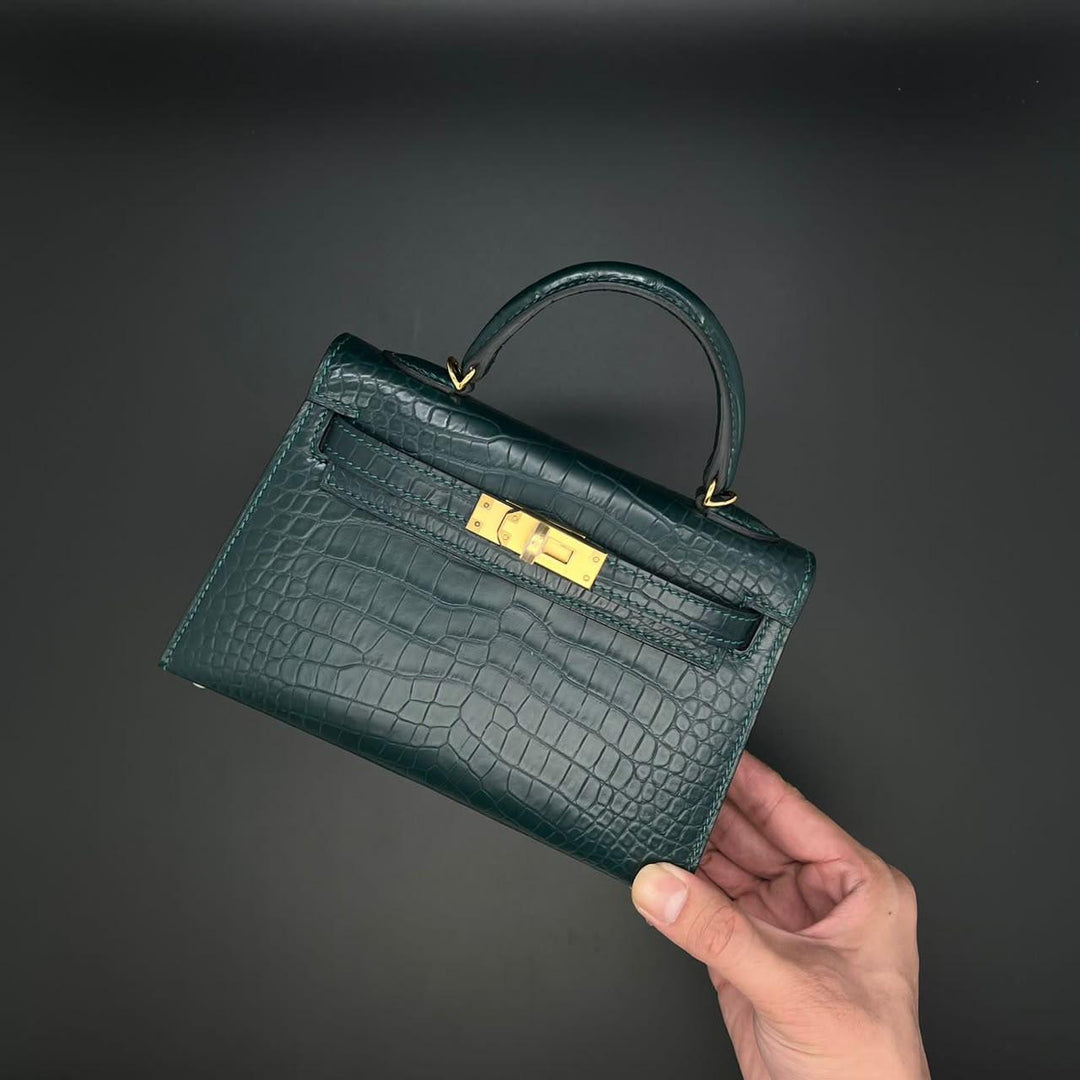 Herm**s crocodile bags.