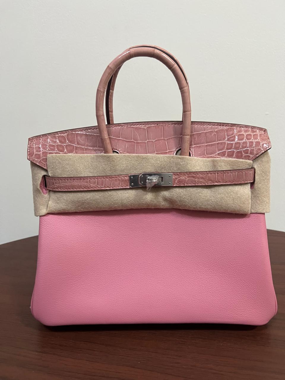 Herm**s crocodile bags.
