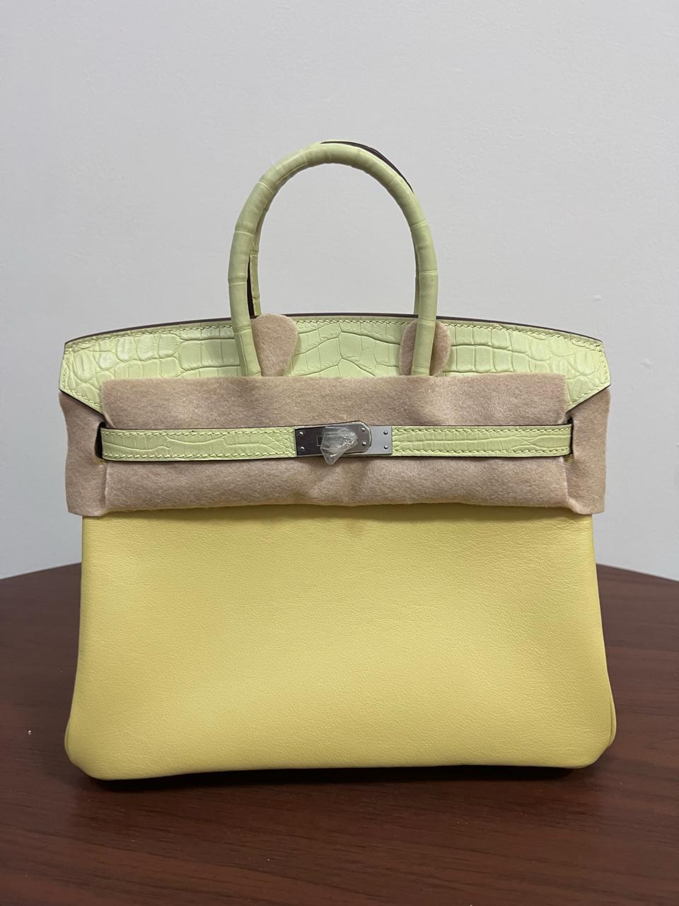 Herm**s crocodile bags.