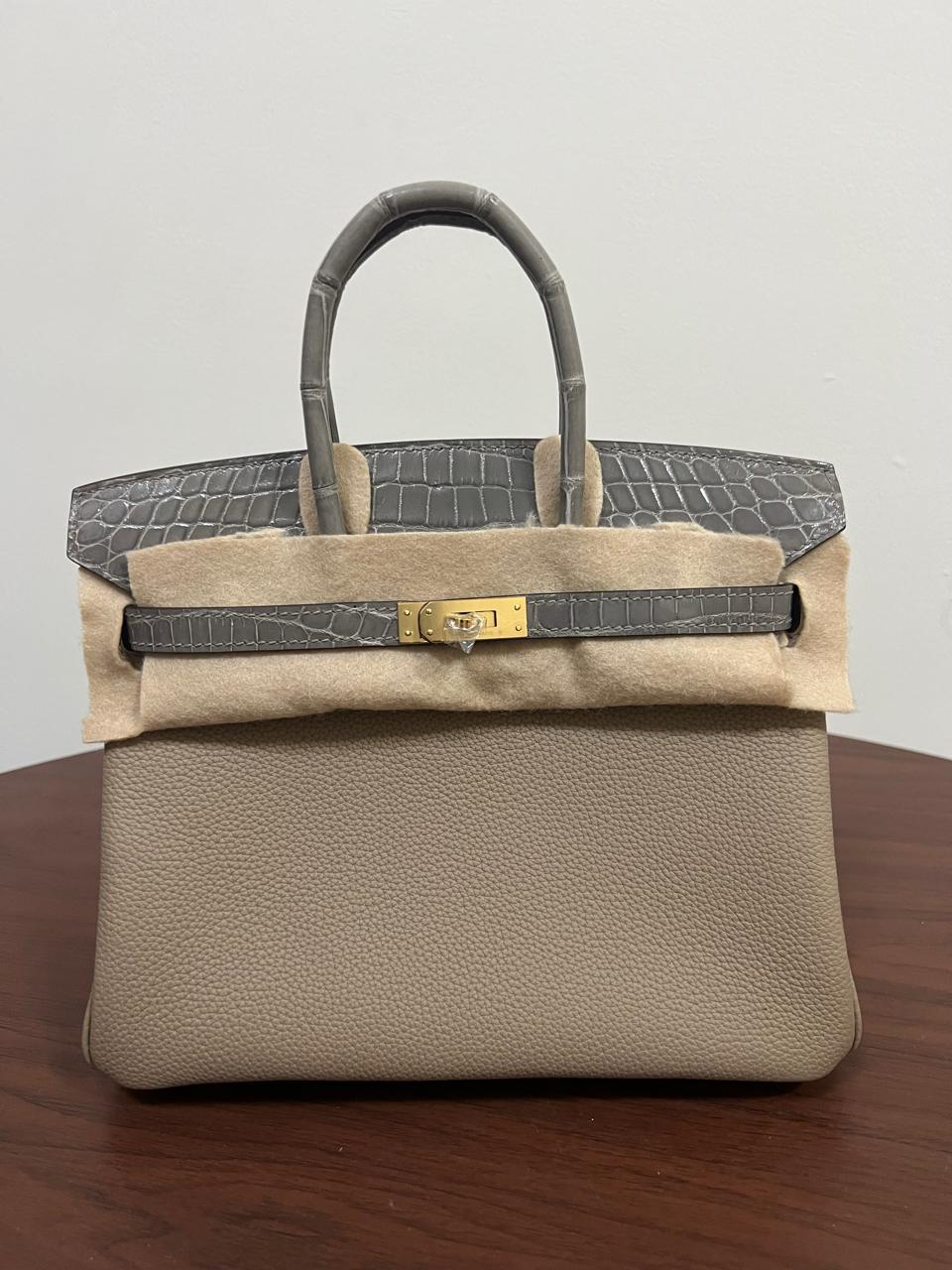 Herm**s crocodile bags.
