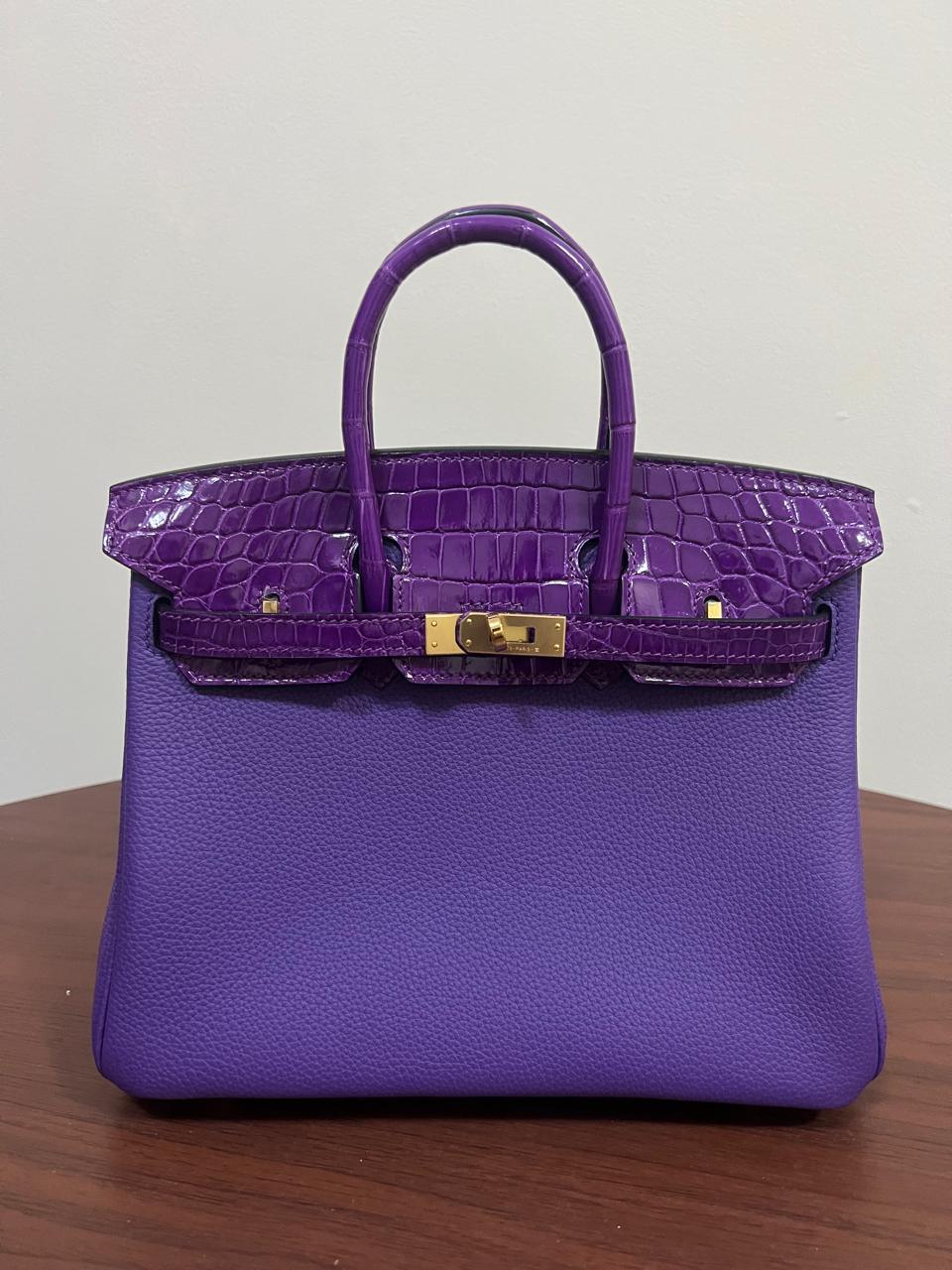 Herm**s crocodile bags.