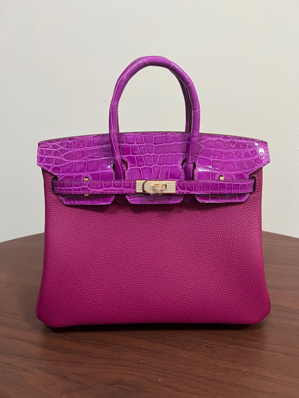 Herm**s crocodile bags.