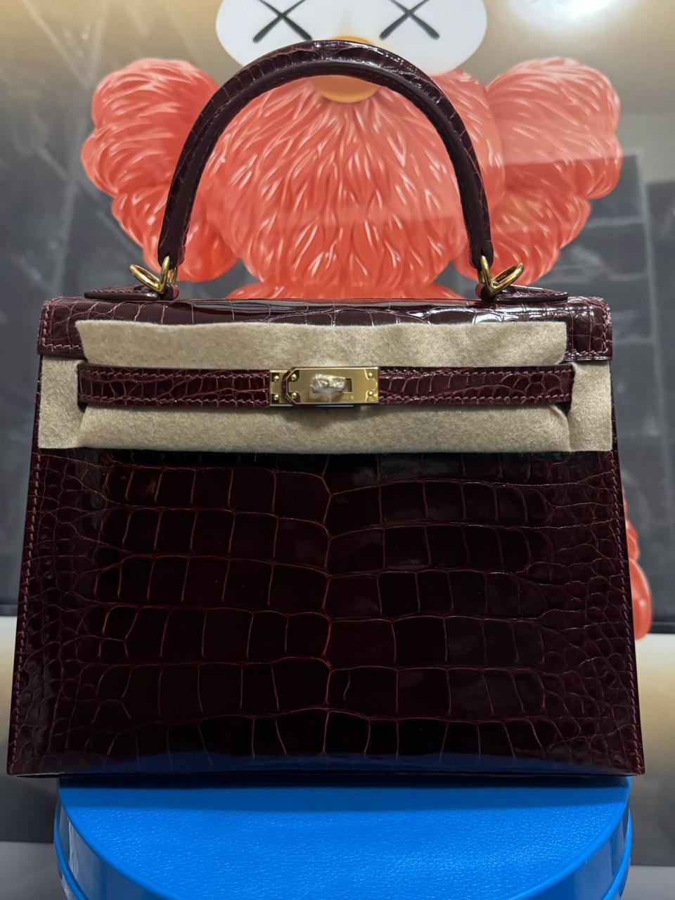Herm**s crocodile bags.