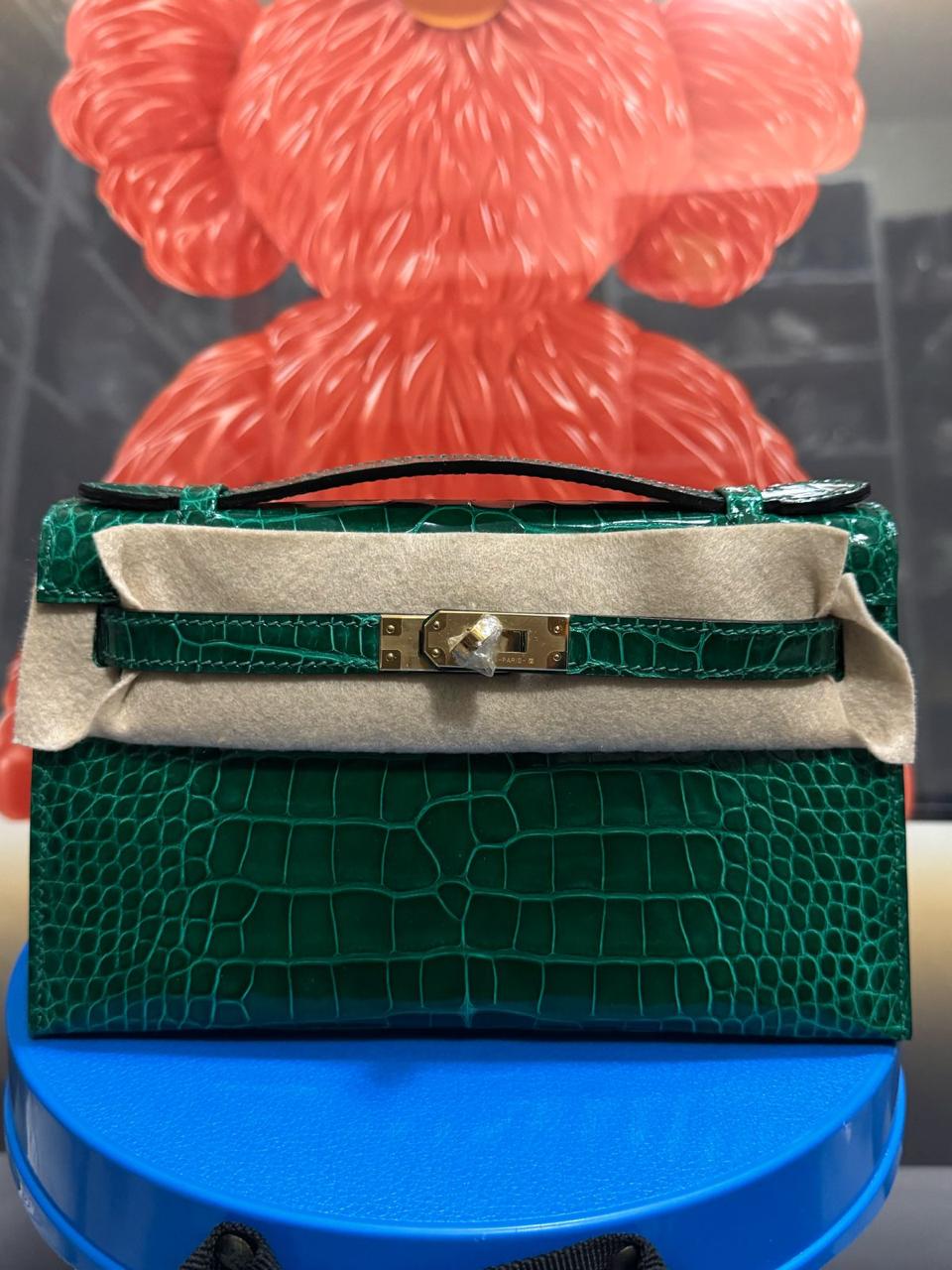 Herm**s crocodile bags.