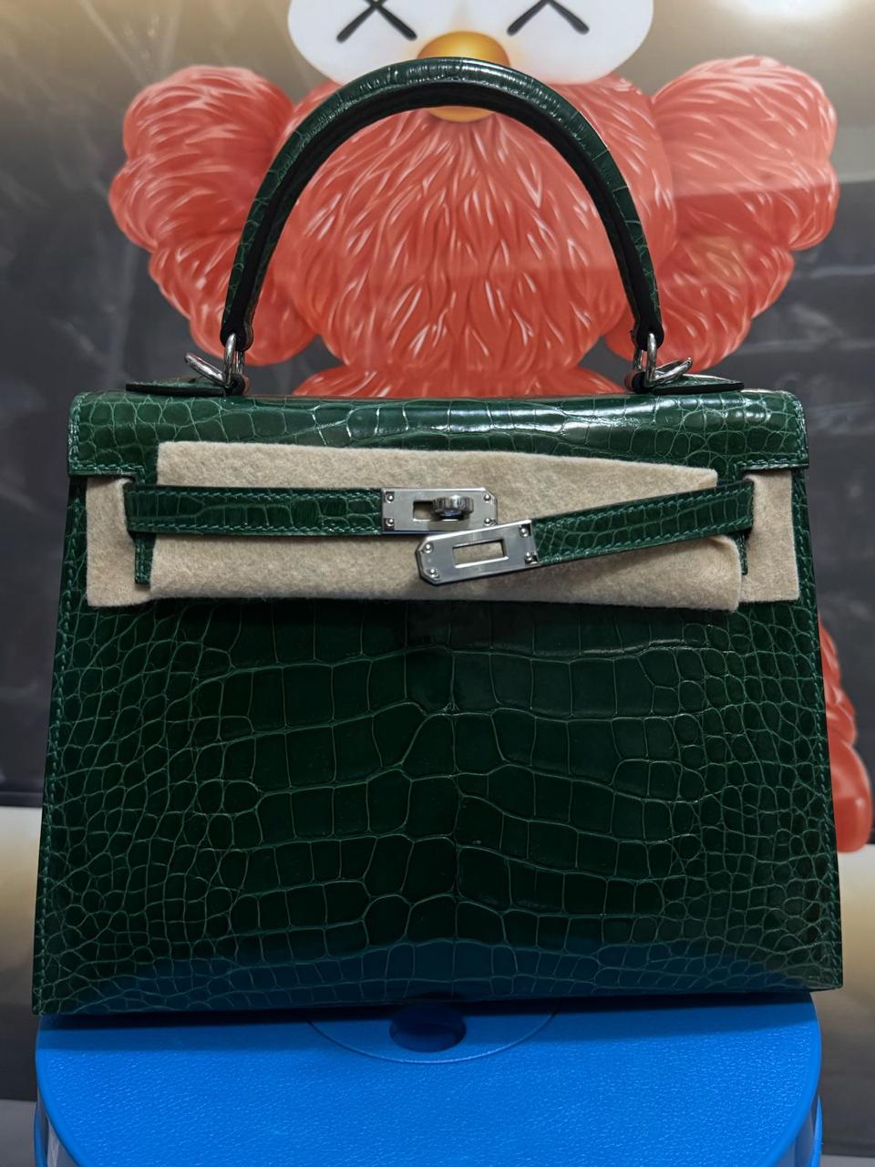 Herm**s crocodile bags.