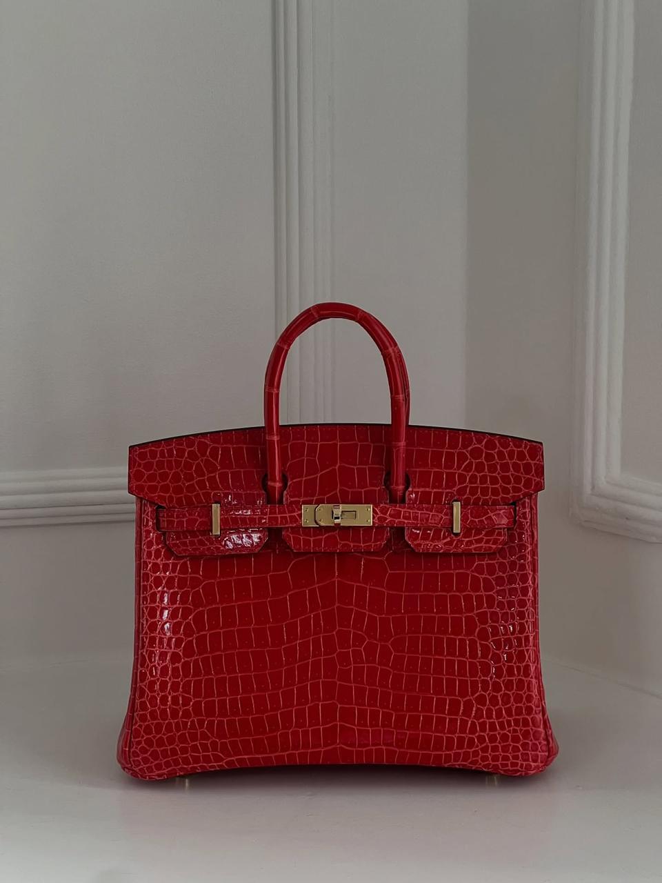 Herm**s crocodile bags.