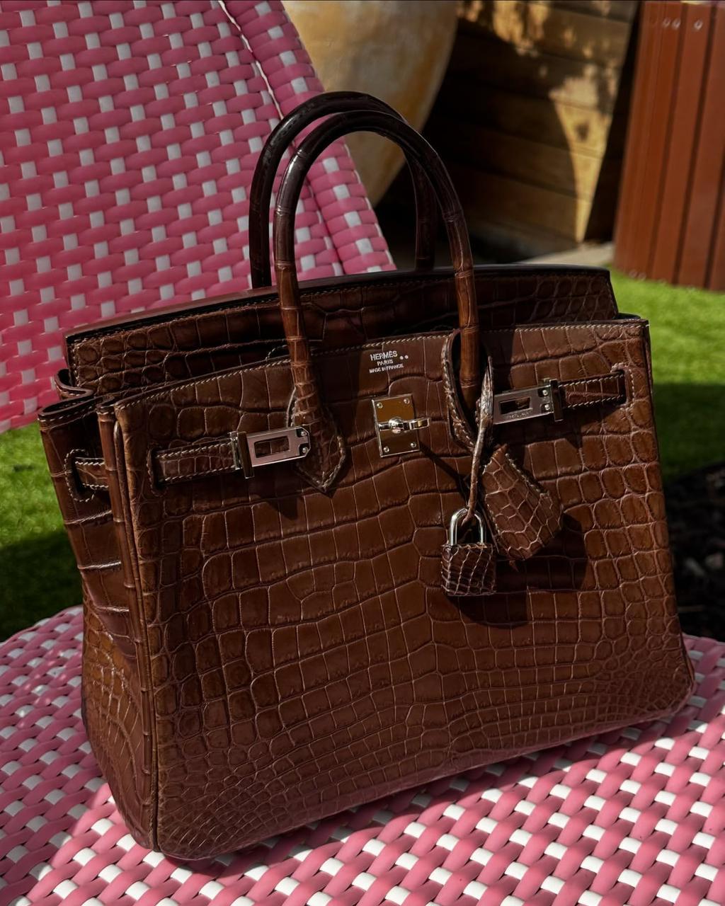 Herm**s crocodile bags.