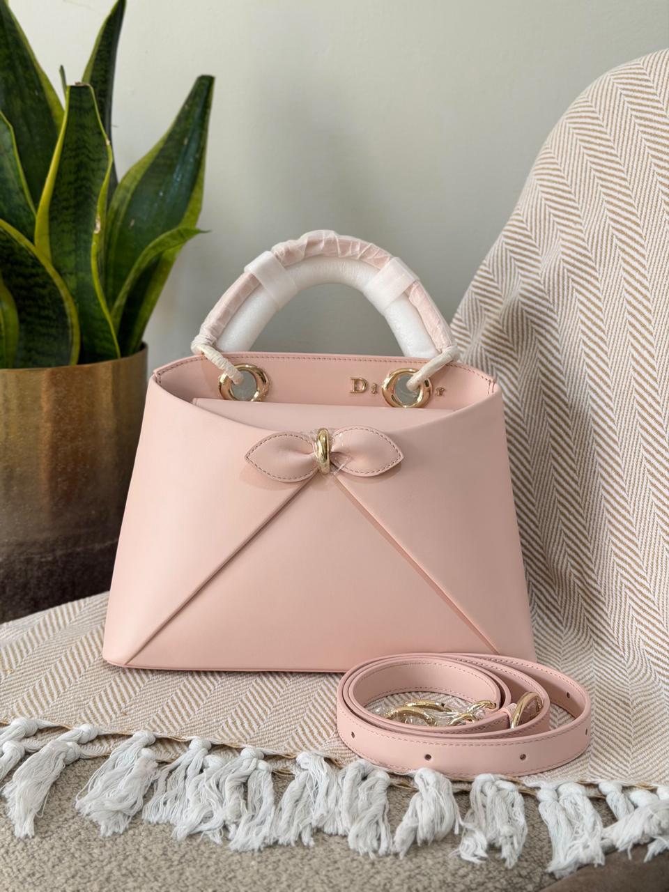 Ladies DI*R bags.