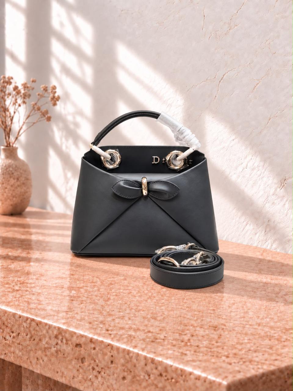 Ladies DI*R bags.